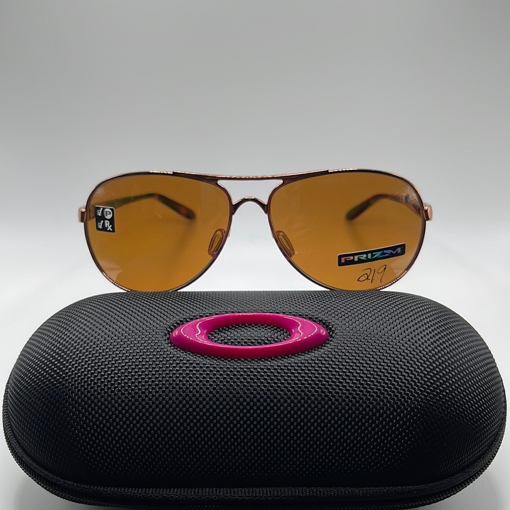 NWOT. Unisex Oakley Feedback sunglasses. Rose gold rims with tortoiseshell arms.
